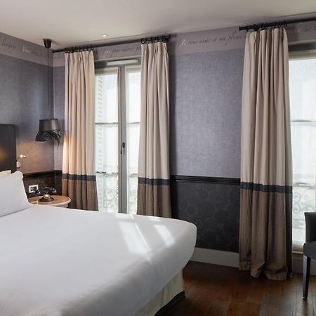 Les Plumes Hotel Parigi Esterno foto