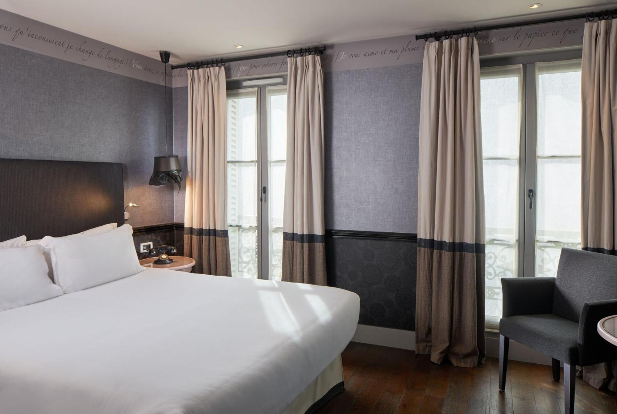 Les Plumes Hotel Parigi Esterno foto